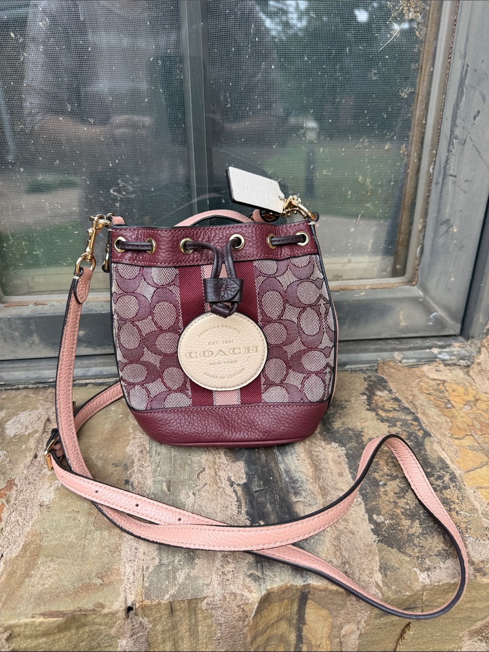 Coach Burgundy Signature Stripe Drawstring Crossbody with Cream Medallion - Picture 2 of 12